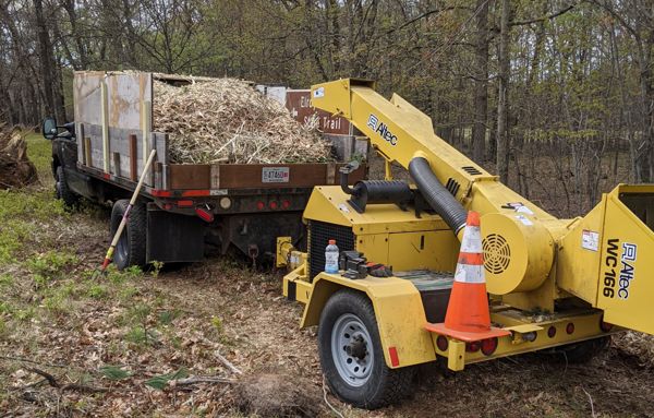 Wood chipper and truck